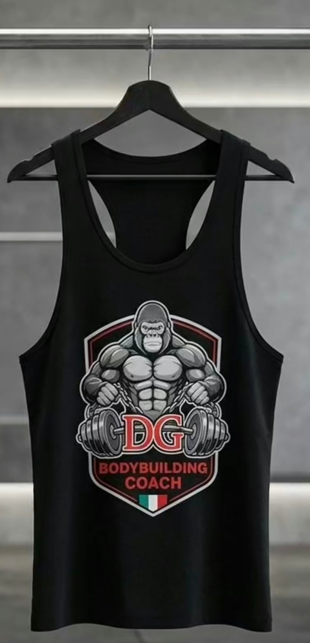 Black sleeveless tank top on hanger with DG Bodybuilding Coach logo featuring muscular man holding dumbbells